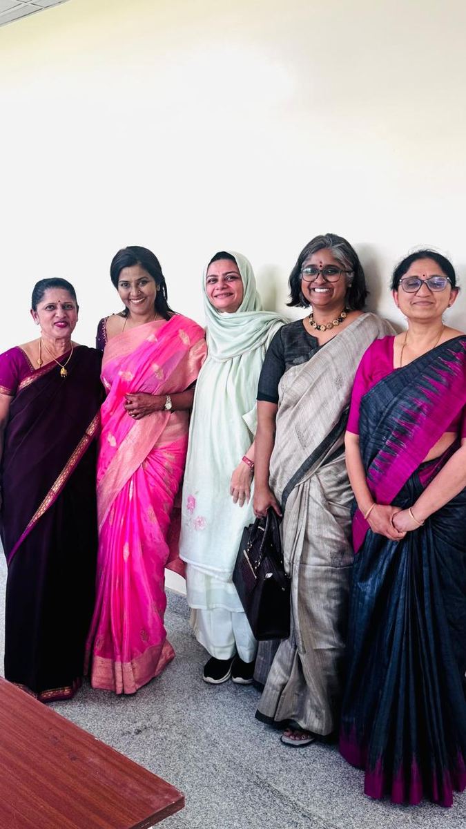 Dr. Mariam Anjum with colleagues — group photo with senior faculty